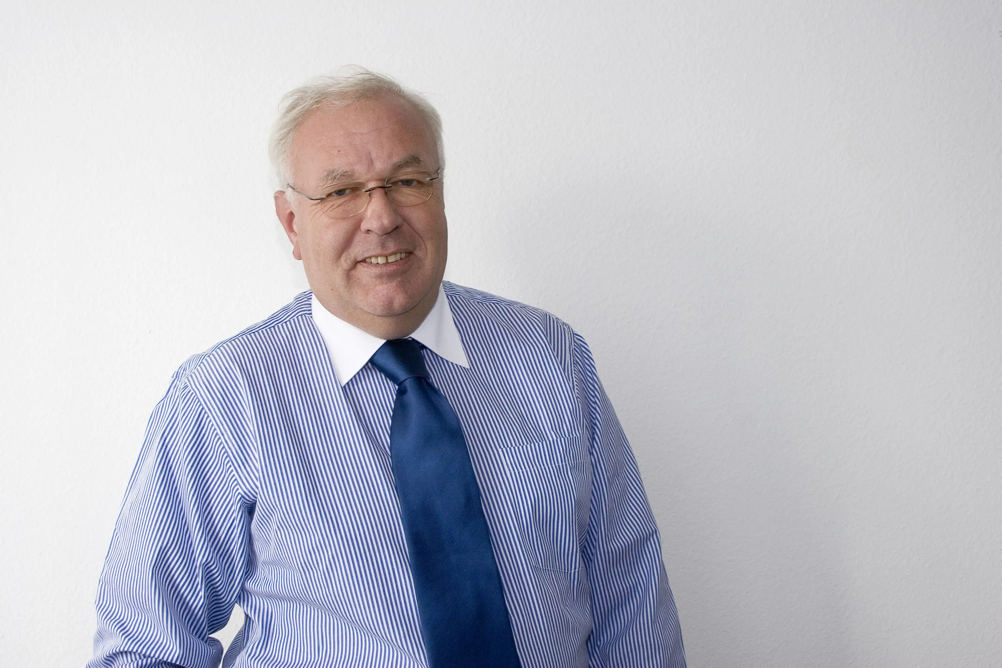Female doctor checking patient blood pressure in clinic
